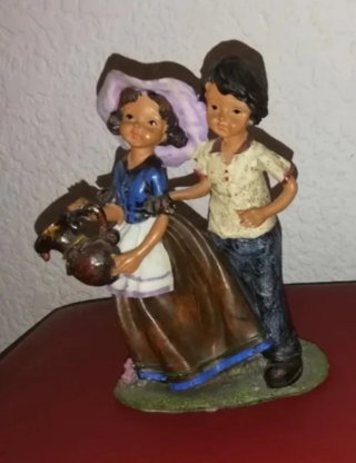 Figura de porcelana pareja
