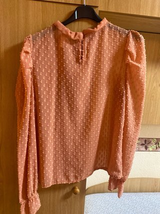 Blusa naranja clarito manga larga