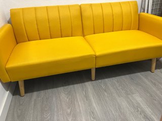 Sofá cama amarillo tipo libro. 2 plazas.