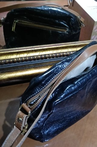 Bolso piel negro y marrón.