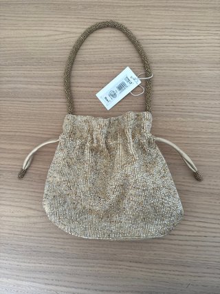 Bolso de fiesta dorado con abalorios