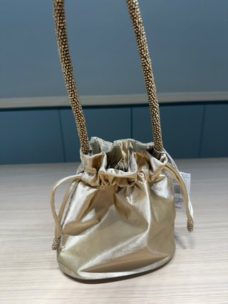 Bolso de fiesta dorado con abalorios