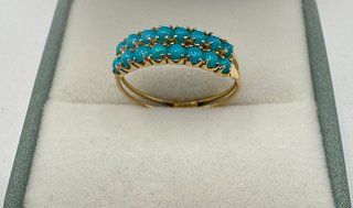 Anillo de oro 18 kt con turquesas