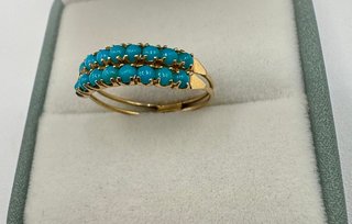 Anillo de oro 18 kt con turquesas