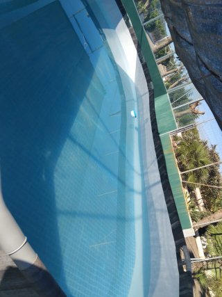 Piscina ovalada tubular imitación  madera