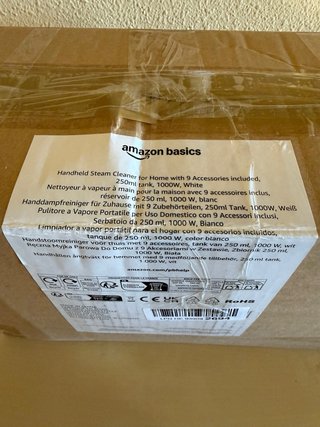 Vaporera Amazon Basics con accesorios