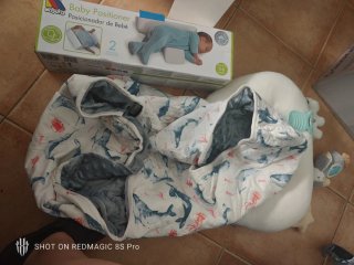 Saco de carrito y cojín posicionador bebé.