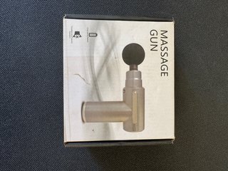 Pistola de masaje