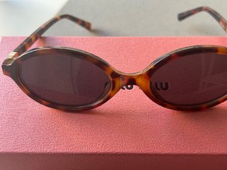 Gafas de sol Miu Miu ovaladas tortuga