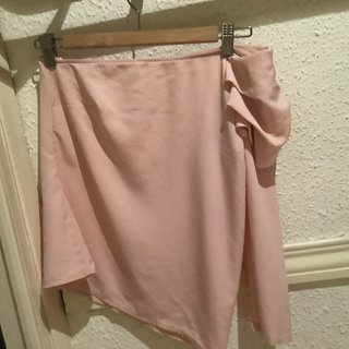 Blusa rosa asimétrica de una manga