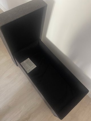 Baúl/banco tapizado gris con almacenaje