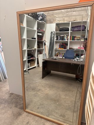 Espejo grande de madera y cristal