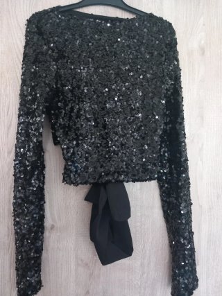 Top lentejuelas negro lazo