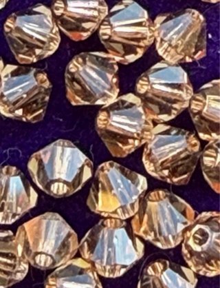 Abalorios Swarovski Dorados