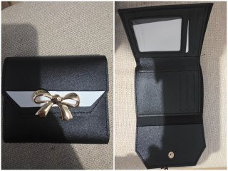 Cartera monedero negra con lazo dorado