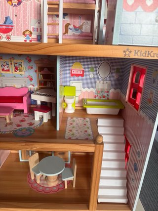 Casa de muñecas KidKraft con muebles