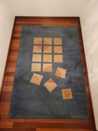 Alfombra diseño geométrico azul, beige y naranja