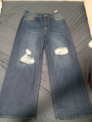 Pantalones vaqueros anchos rotos