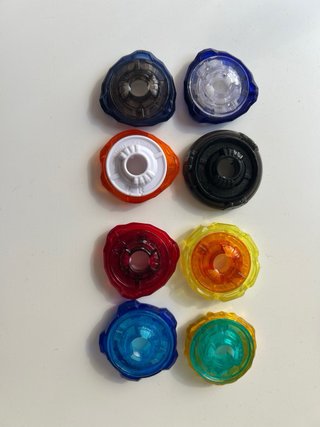 Lote Beyblade X - 11 beys (uno en caja) + estadio