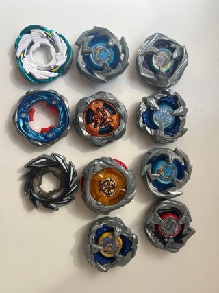 Lote Beyblade X - 11 beys (uno en caja) + estadio