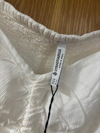 Blusa blanca fruncida manga larga