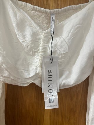 Blusa blanca fruncida manga larga