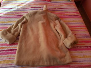Pelliccia sintetica beige taglia 48