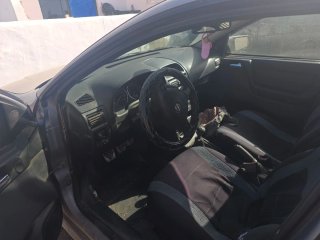 Opel astra 2005  5 puerta se cambia moto 125  o se