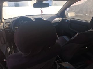 Opel astra 2005  5 puerta se cambia moto 125  o se