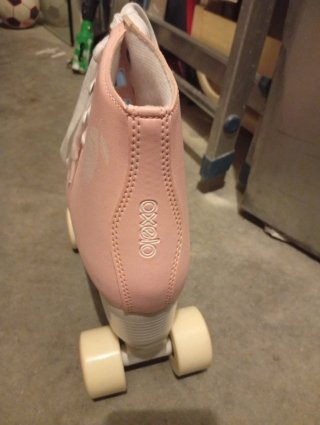 Patines rosas Oxelo y rodilleras