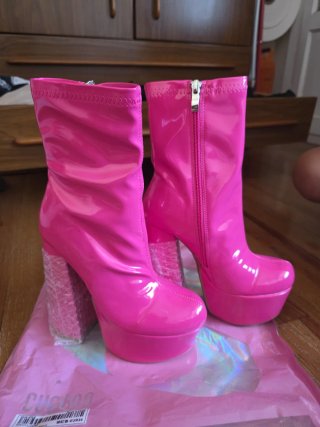 Botas de tacón alto fucsia