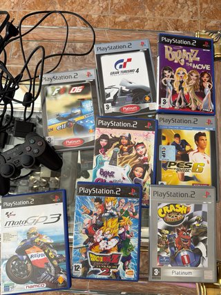 Console PlayStation 2 (PS2) con Volante e Giochi
