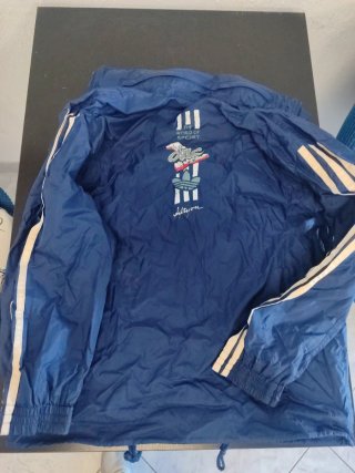 Chubasquero Adidas niño azul talla 140..
