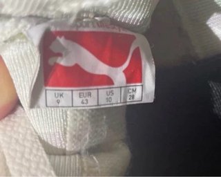Zapatillas Puma Blancas y Negras