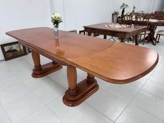 Mesa de comedor extensible de madera