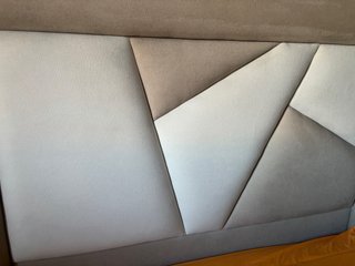 Cabecero de tela y polipiel beige y marrón