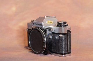 Olympus OM-10 Cámara Analógica Plata y Negra