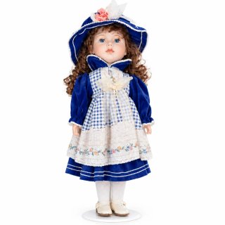 Muñeca de porcelana vintage con vestido azul