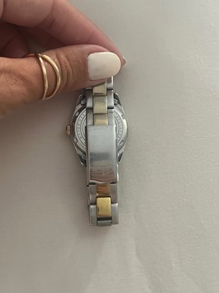 Reloj Lotus Oro y Plata