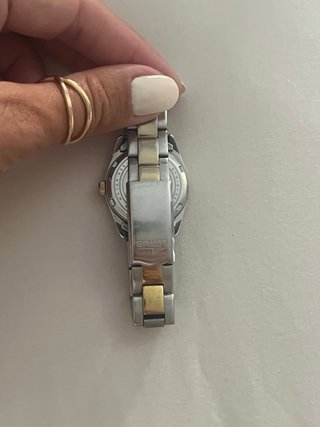 Reloj Lotus Oro y Plata