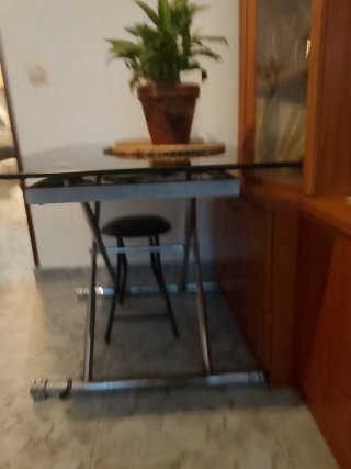 Mesa de comedor de cristal negra