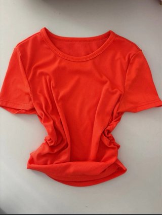 Top naranja pegado