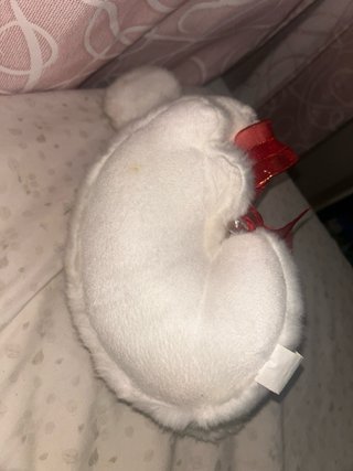 Peluche perro blanco con lazo rojo