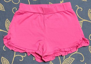 Shorts de Niña Rosa con Volantes.