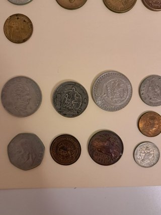 Monedas de México y Perú Varias