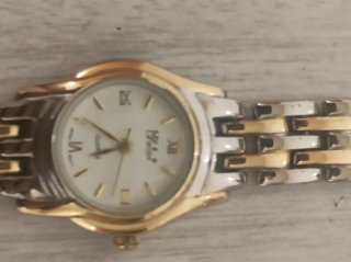 Reloj  señora color oro y plata