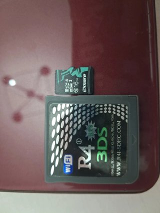Nintendo DSi XL Marrón + tarjeta de juegos