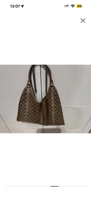 Bolso Gucci GG Canvas Beige y Dorado Grande