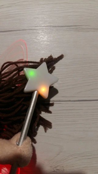 Bambola fata con bacchetta magica