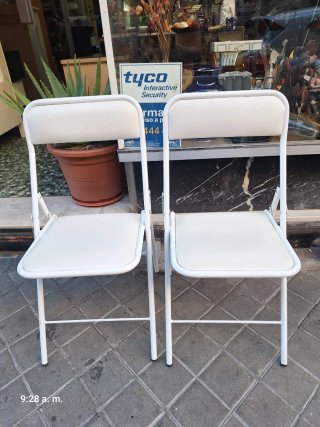 2 Sillas Plegables de Polipiel y Metal unidad 10e